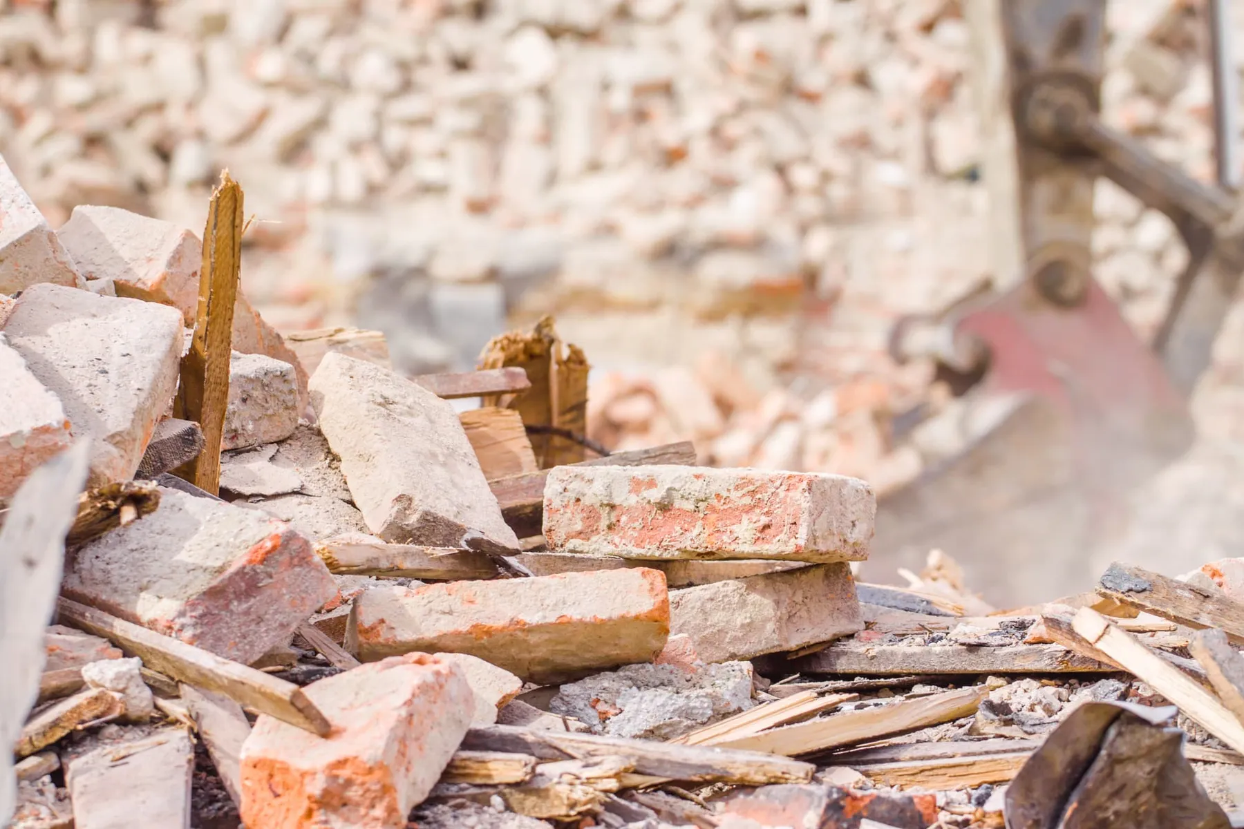 Broken concrete and brick rubble ready for removal